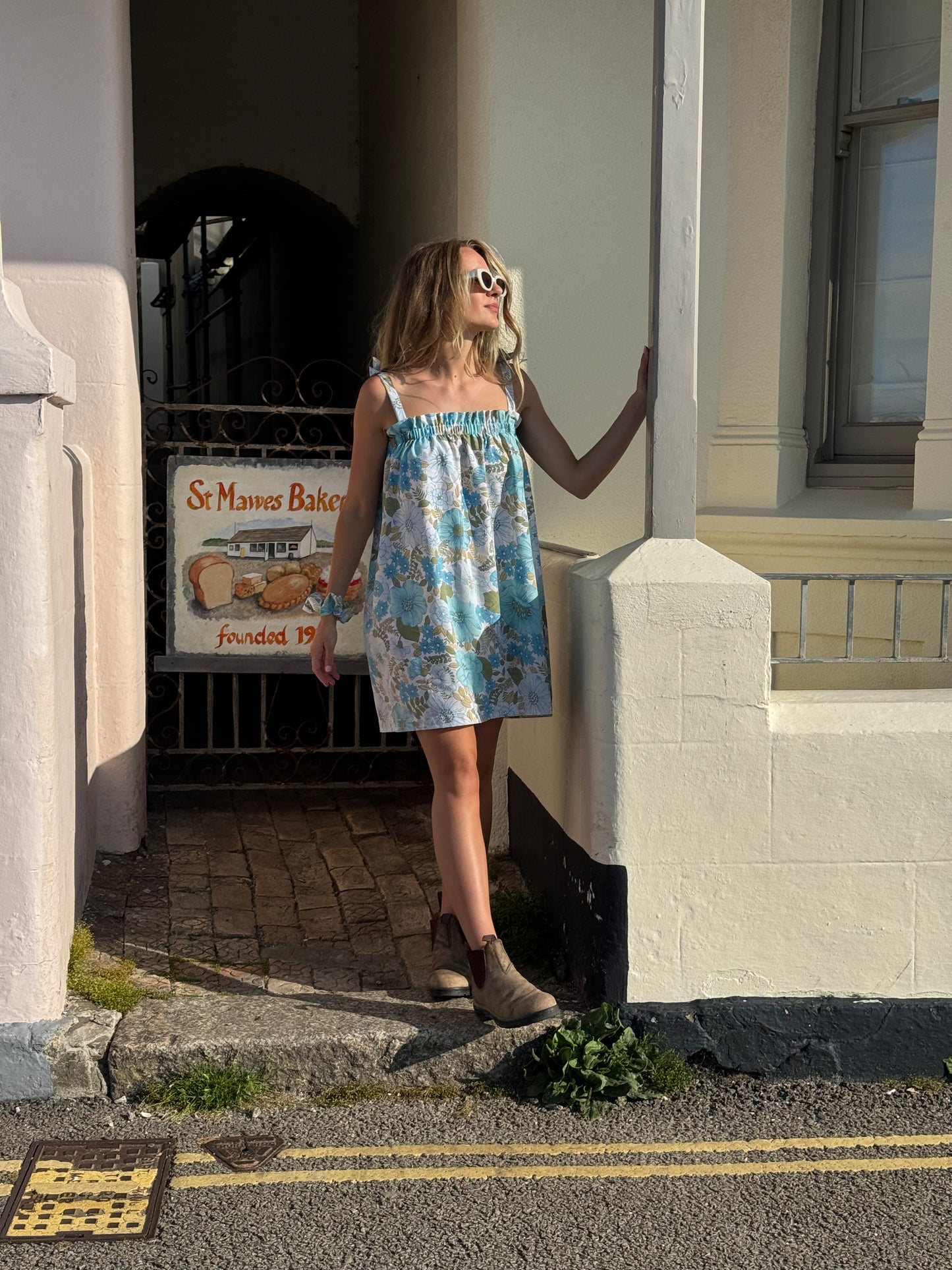 Girl in blue floral dress